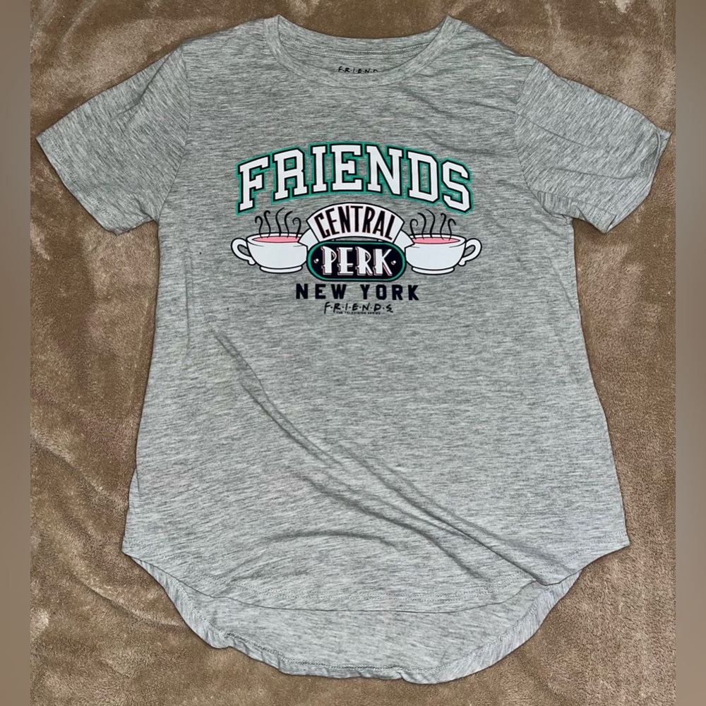 Friends TV Show Central Perk T Shirt Size Medium. Color Gray. Rounded bottom hem